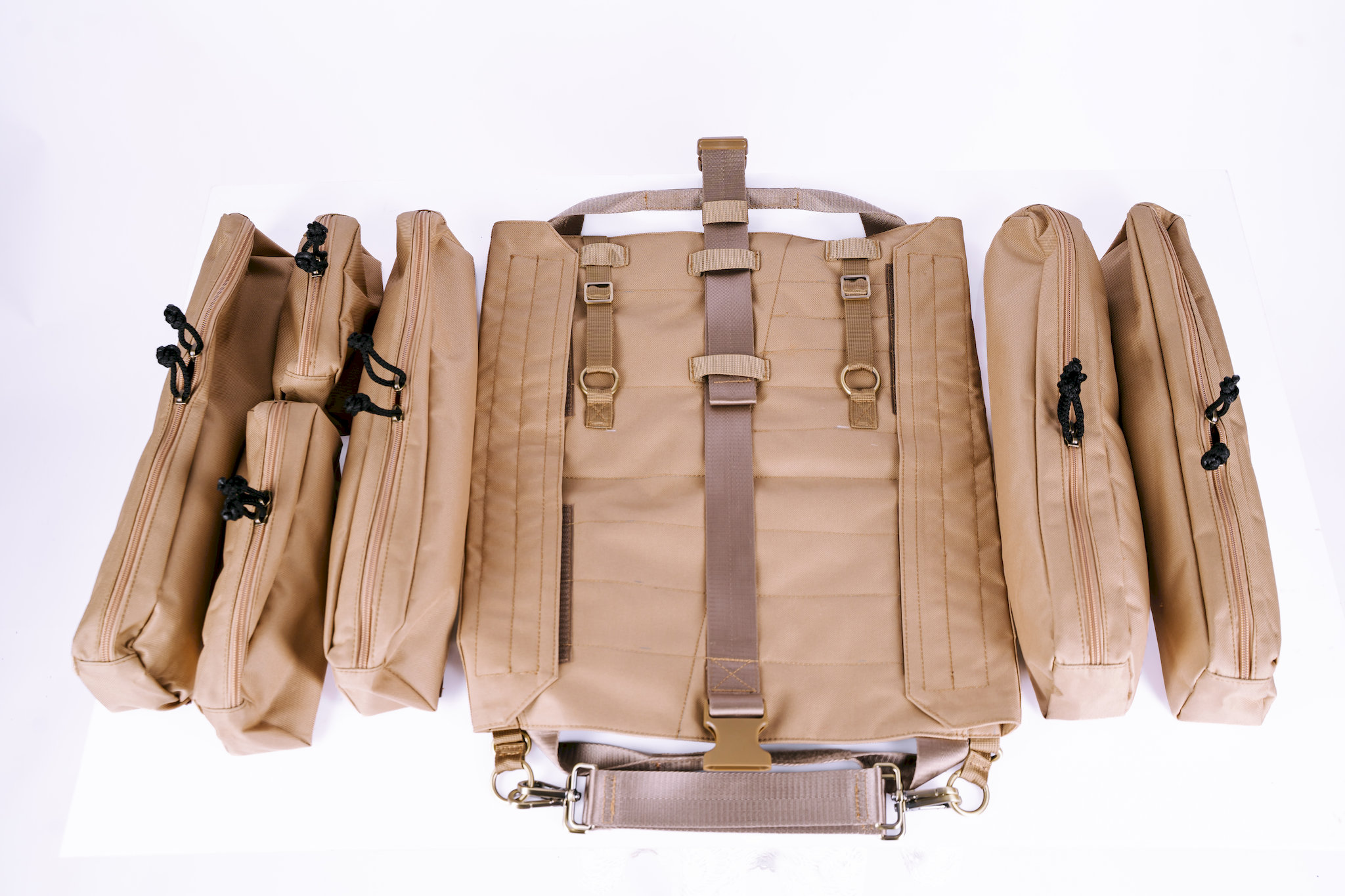 Trooper Booster fully open flat showing all 9 zipped detachable pocket cases and 7 PALS velcro rows