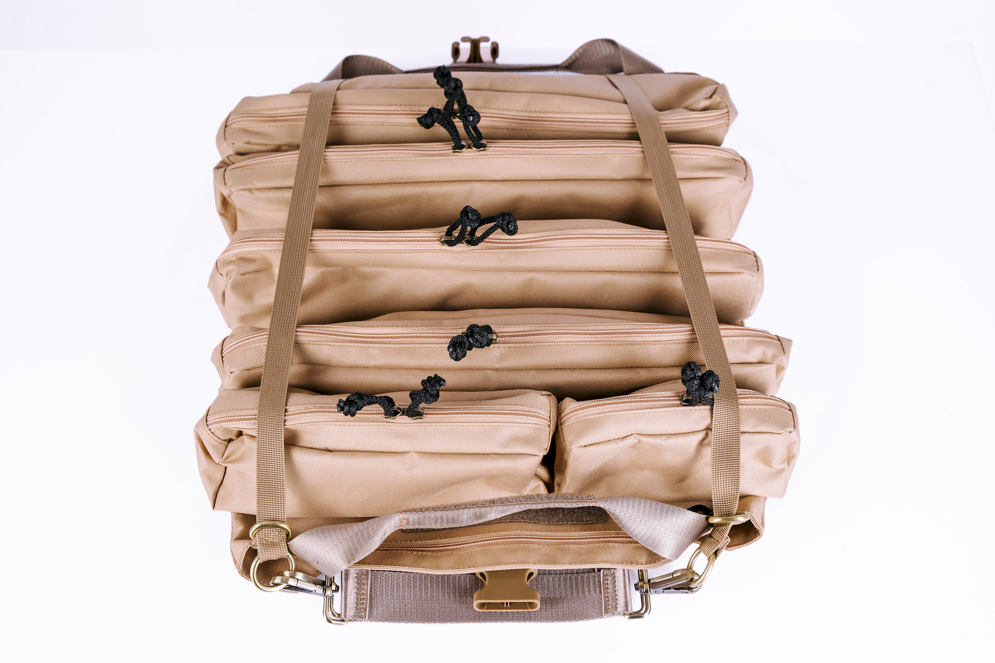 Top view of heavy-duty zipper pulls and adjustable shoulder strap on canvas tool bag