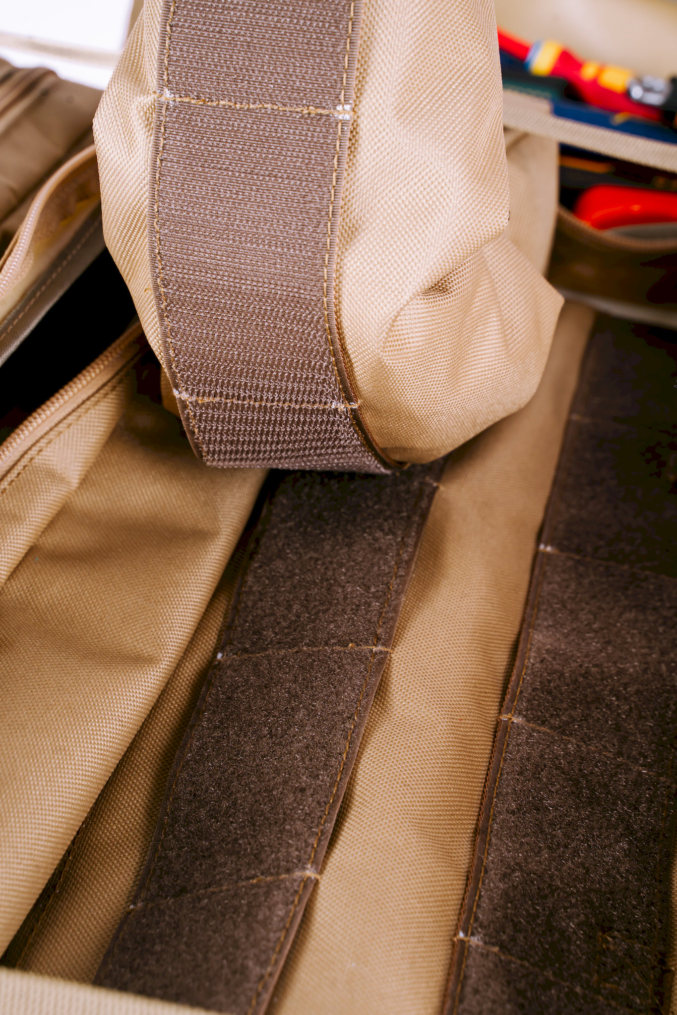 Close-up of PALS (Pouch Attachment Ladder System) velcro row attachment on Trooper Booster